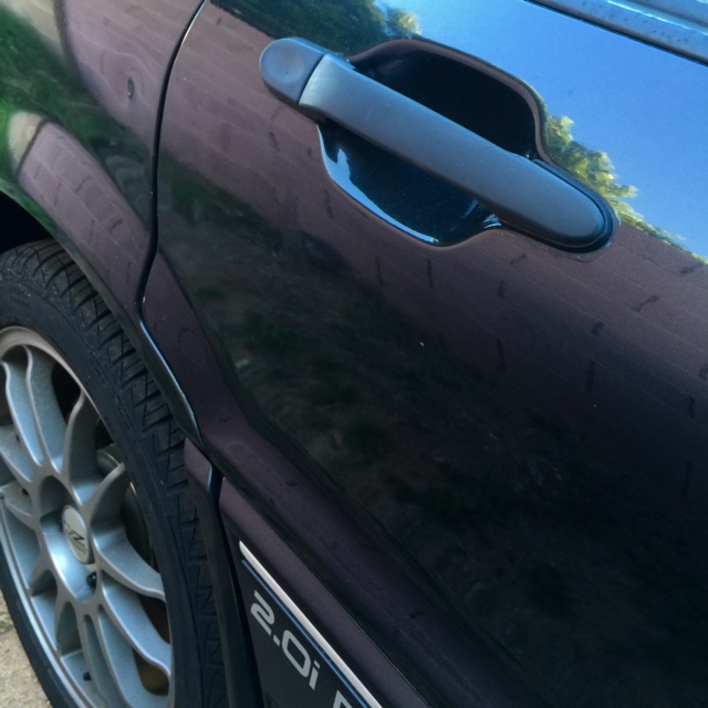 rear_passenger_quarter_panel_blemish.jpg